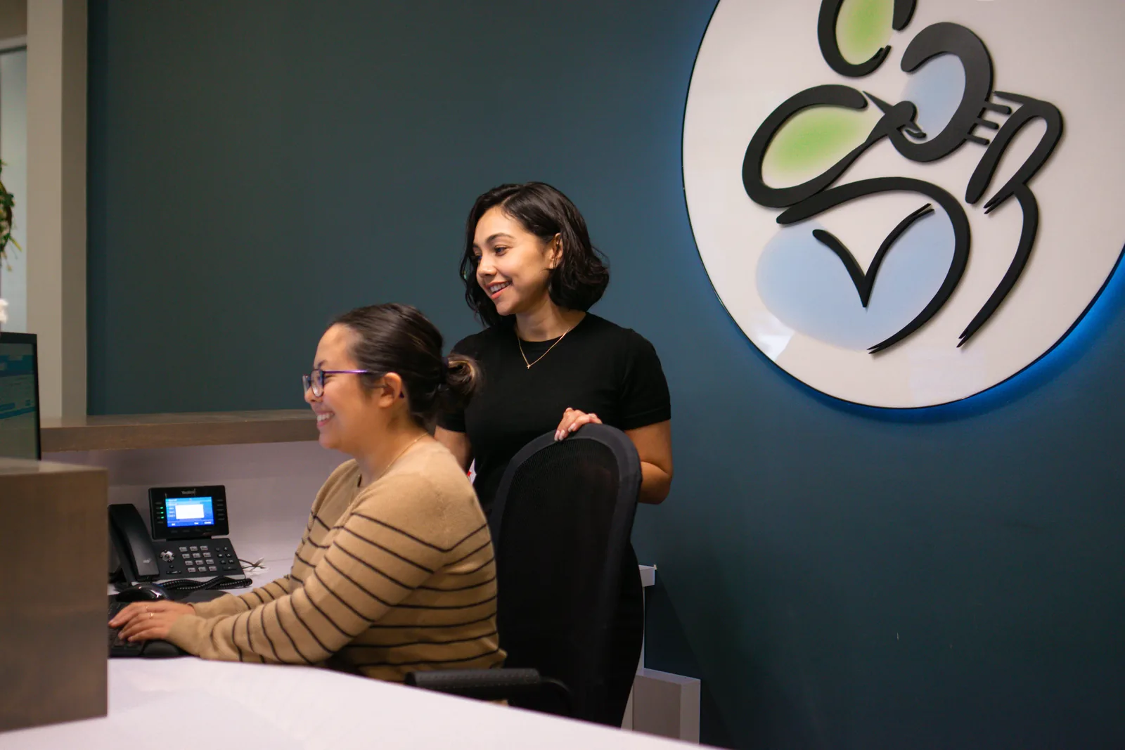 The welcoming front desk team at Marconi Dental Group